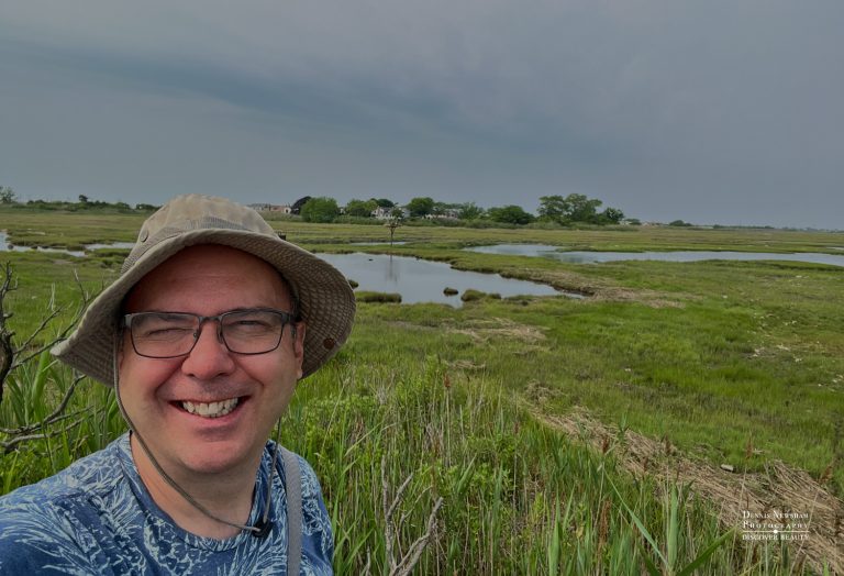 Dennis Newsham posing at wetlands in Long Island during a summer birding day trip from NYC – photo by Dennis Newsham