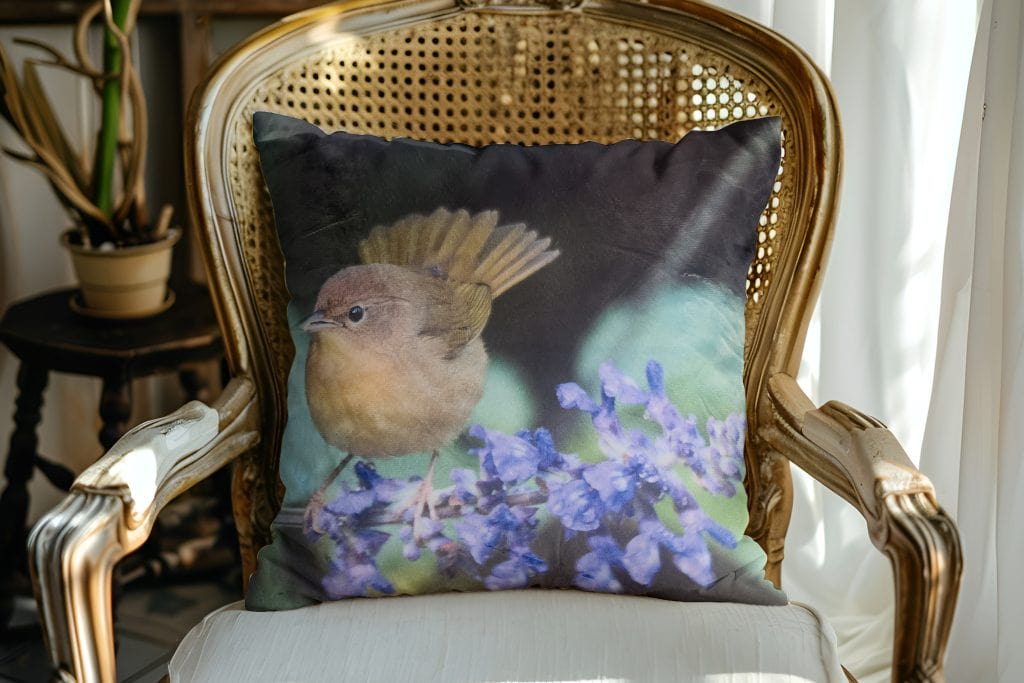 Common Yellowthroat Pillow Cover setting on a chair