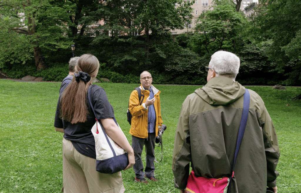 Dennis Newsham with two others having a wildlife photography workshop in Central Park NYC
